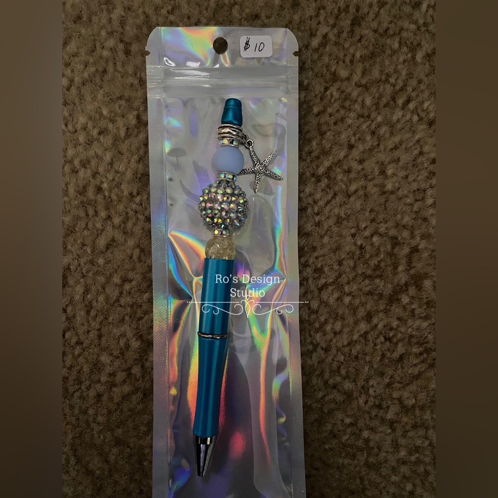 Beautiful beaded pen with dangle charm